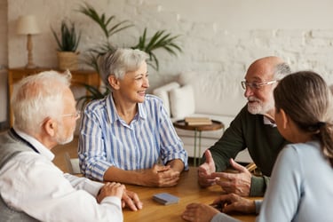 elderly couples chatting